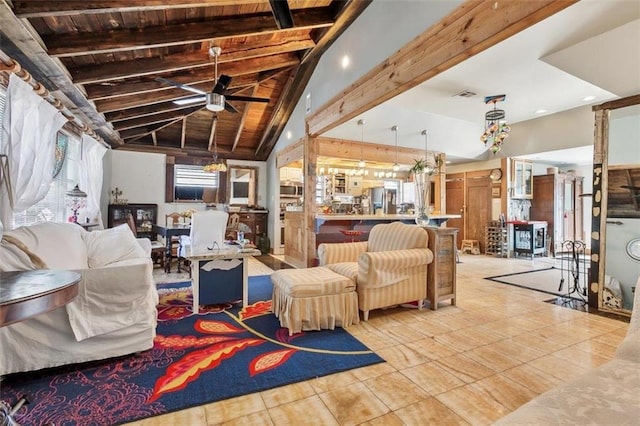 tiled living room featuring ceiling fan, wood ceiling, and vaulted ceiling with beams