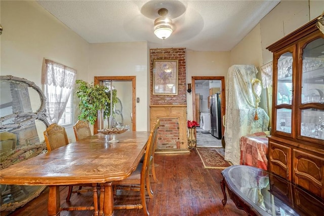 dining area with dark hardwood / wood-style flooring and ceiling fan