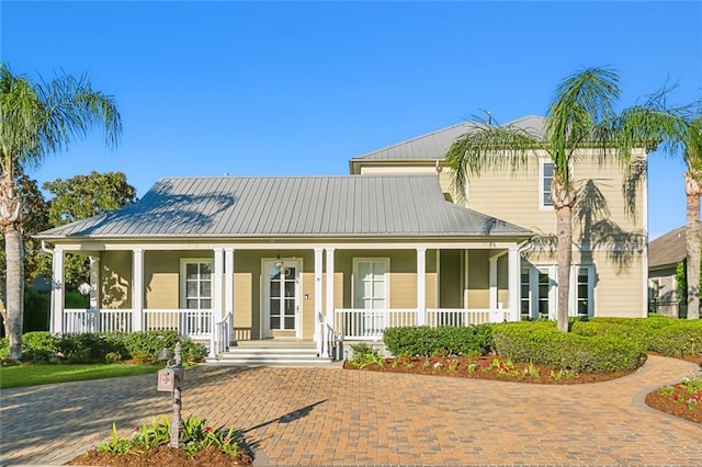 view of front of property featuring covered porch