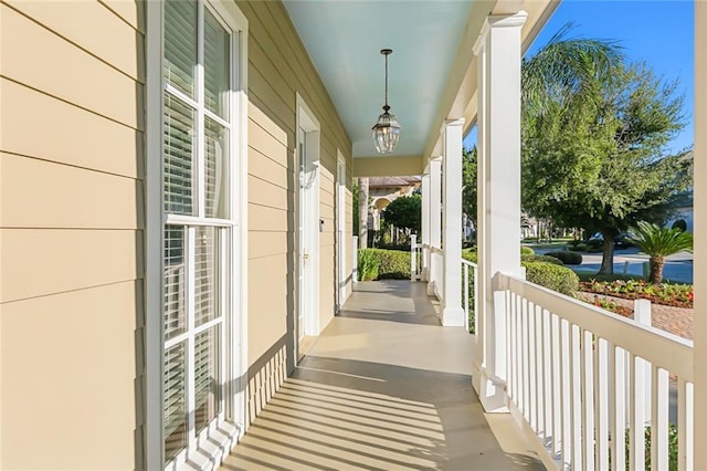 balcony featuring a porch