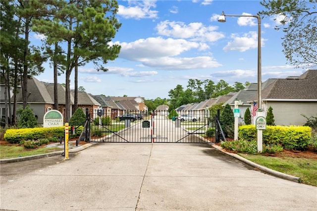 view of gate with a residential view