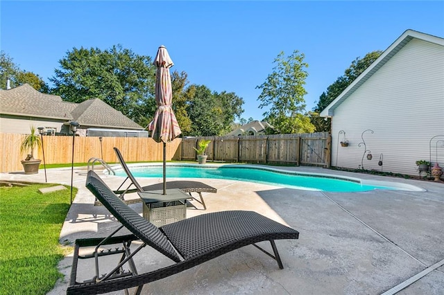 view of pool featuring a patio area