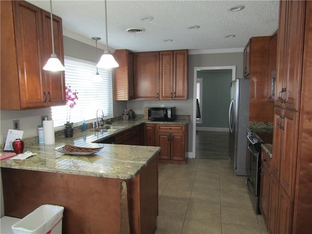 kitchen featuring black appliances, sink, kitchen peninsula, pendant lighting, and ornamental molding