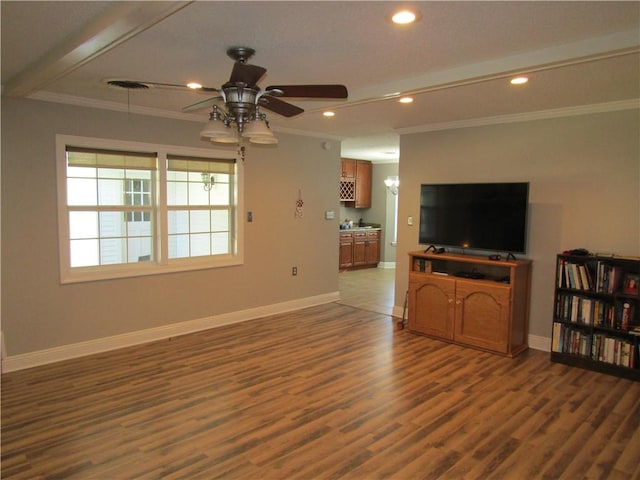 living room featuring crown molding, dark hardwood / wood-style floors, and ceiling fan