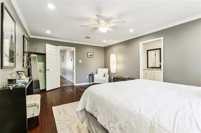 bedroom with crown molding, ceiling fan, ensuite bathroom, and dark hardwood / wood-style flooring