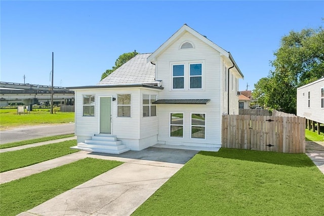 view of front of house with a front yard