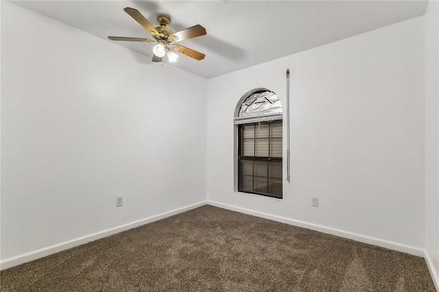 empty room with carpet and ceiling fan