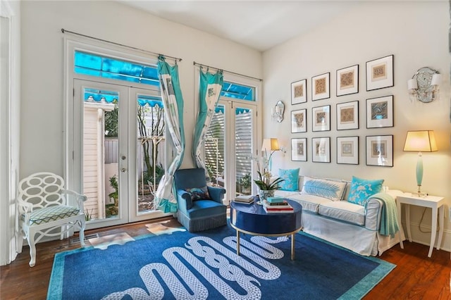 sitting room with french doors and dark hardwood / wood-style floors