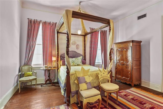 bedroom featuring dark hardwood / wood-style floors