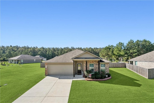 view of front of house with a front lawn and a garage