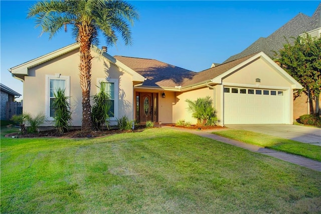 single story home featuring a garage and a front lawn