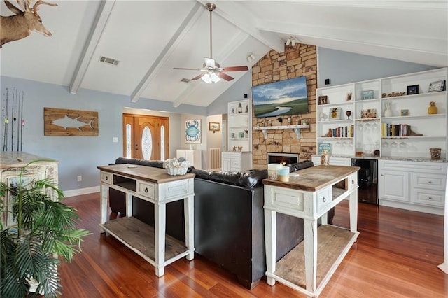 kitchen with dark wood-type flooring, white cabinets, wooden counters, and beverage cooler