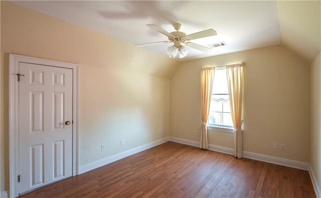 additional living space featuring hardwood / wood-style flooring, ceiling fan, and lofted ceiling