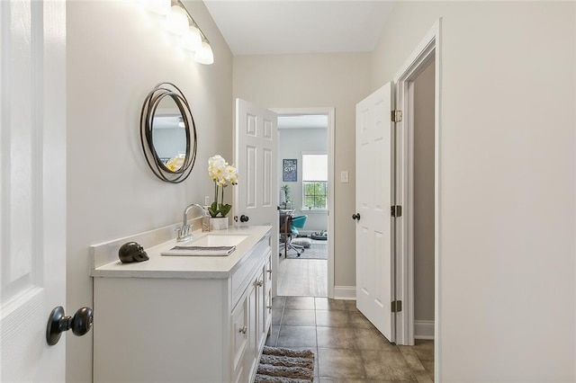 bathroom featuring vanity and tile patterned flooring