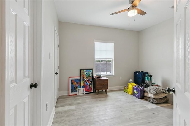 playroom featuring light hardwood / wood-style flooring and ceiling fan
