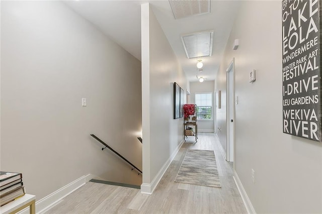 hallway featuring light hardwood / wood-style floors