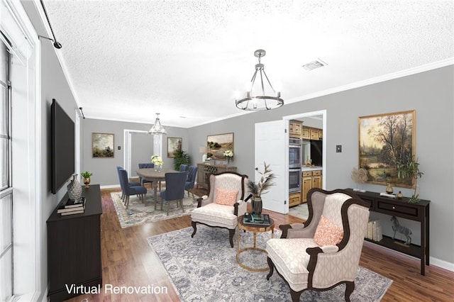 living room with an inviting chandelier, crown molding, a textured ceiling, and dark hardwood / wood-style floors