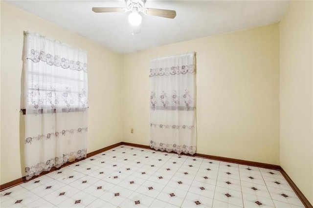 unfurnished room with ceiling fan