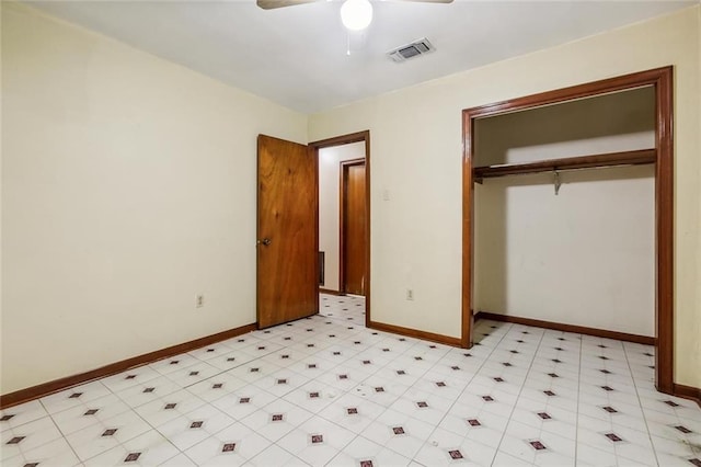 unfurnished bedroom featuring a closet and ceiling fan