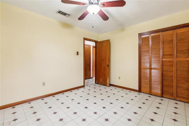 unfurnished bedroom with a closet and ceiling fan