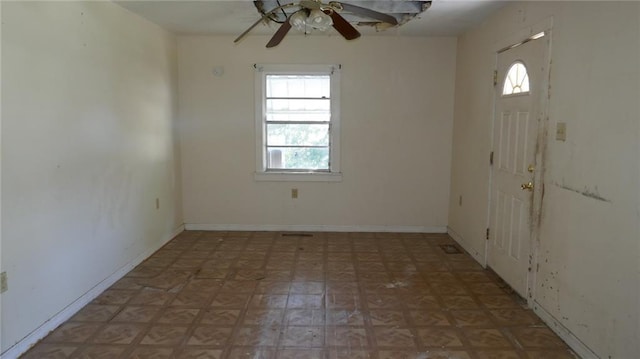 spare room featuring ceiling fan