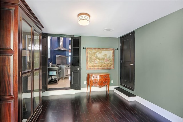 doorway to outside featuring hardwood / wood-style floors