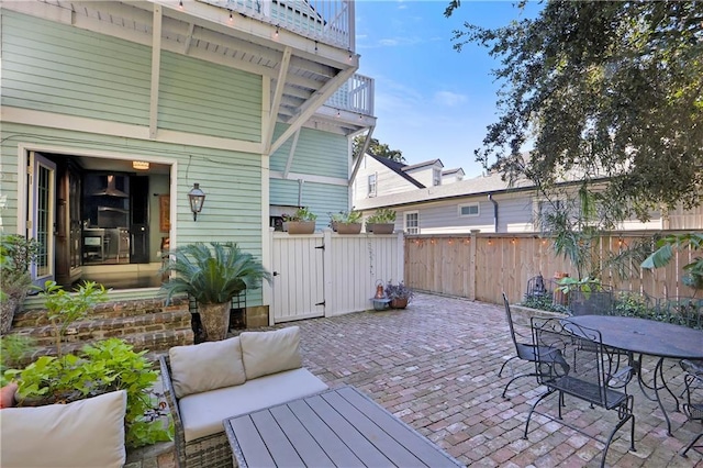 view of patio / terrace featuring a balcony