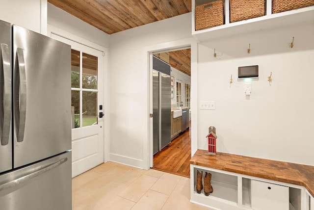 mudroom featuring wood ceiling and light hardwood / wood-style flooring