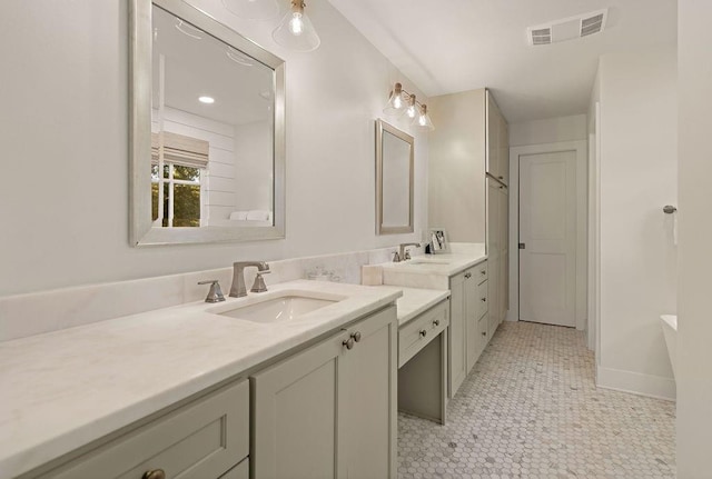 bathroom featuring vanity and tile patterned flooring