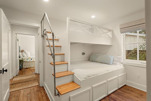 bedroom featuring hardwood / wood-style floors