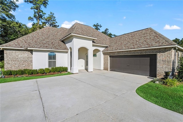 view of front of home featuring a garage