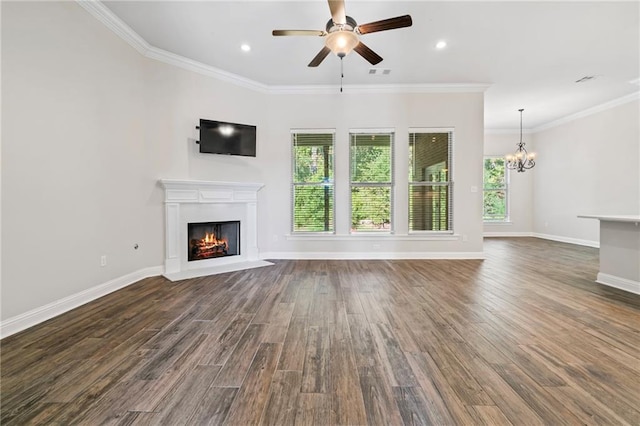 unfurnished living room featuring ornamental molding and dark hardwood / wood-style floors