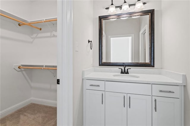 bathroom featuring vanity and walk in shower