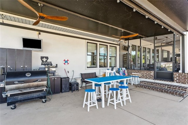 view of patio / terrace with ceiling fan