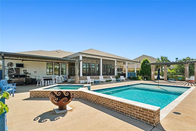 view of swimming pool with a patio