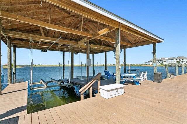 dock area with a water view