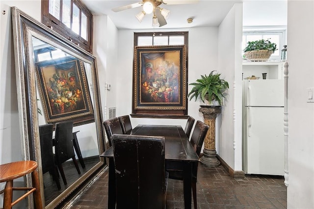 dining room with ceiling fan