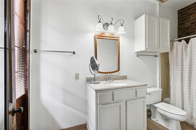 full bathroom with toilet, shower / tub combo with curtain, vanity, and tile patterned flooring