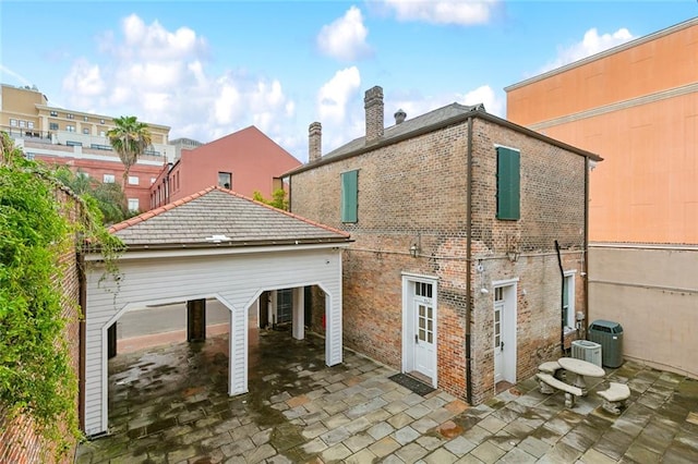 rear view of house with a patio area