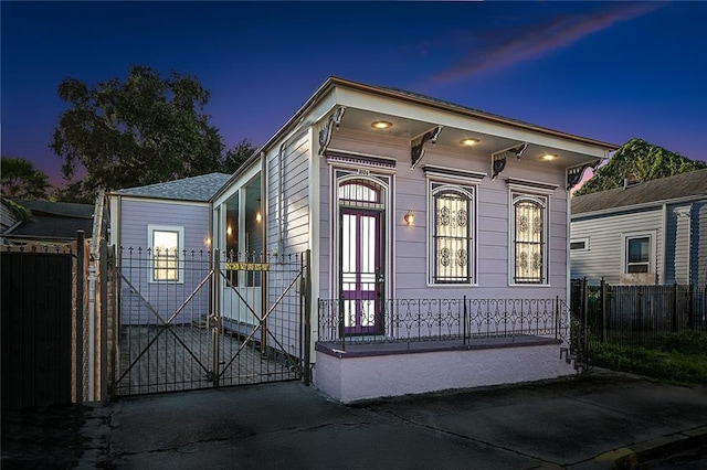 view of property exterior at dusk