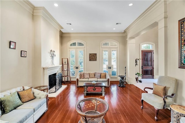 living room featuring ornamental molding, french doors, and dark wood-type flooring