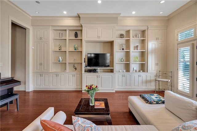 living room featuring dark wood-type flooring and crown molding