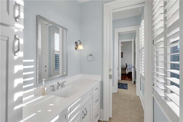 bathroom with vanity and tile patterned floors