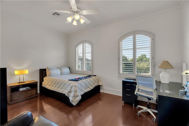 bedroom with ceiling fan, crown molding, and dark hardwood / wood-style flooring