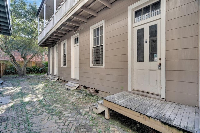 property entrance featuring a patio