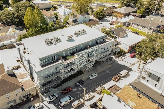 birds eye view of property with a residential view