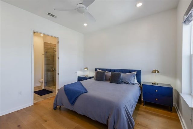 bedroom with visible vents, connected bathroom, recessed lighting, wood finished floors, and a ceiling fan