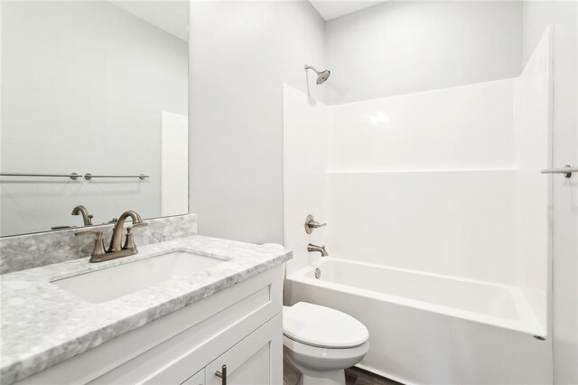 5019 Colorado St, Bay Saint Louis, MS 39520 - bathroom with shower / washtub combination, toilet, and vanity