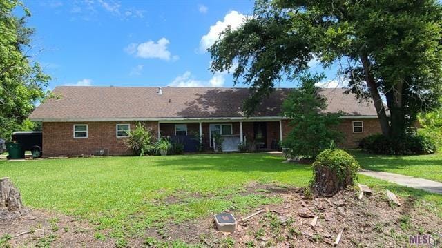 view of front of home with a front yard