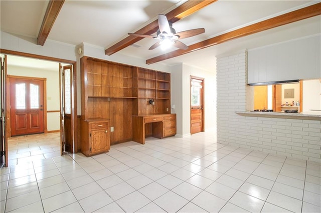 unfurnished living room with light tile patterned flooring, beamed ceiling, and ceiling fan